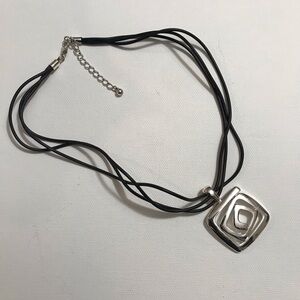 Silver Tone Cool Swirl Pendant on Black Multi Stranded Cord 17 inches